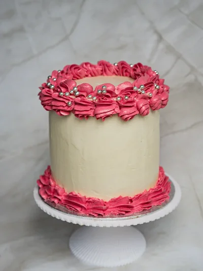 Luxurious wedding cake with floral accents in Peterborough