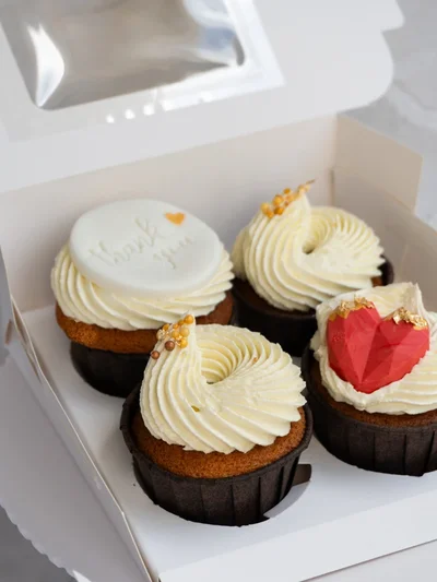 Delicious handcrafted cupcakes with floral designs in Cambridge