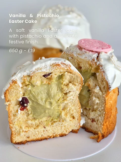 Vanilla and pistachio Easter Paska sliced open to show the pistachio filling