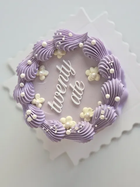 Lilac bento cake with vintage piping, flowers and lettering