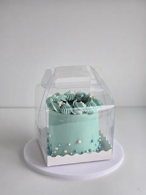 Blue mini bento cake in a clear gift box with pearl border and edible photo print
