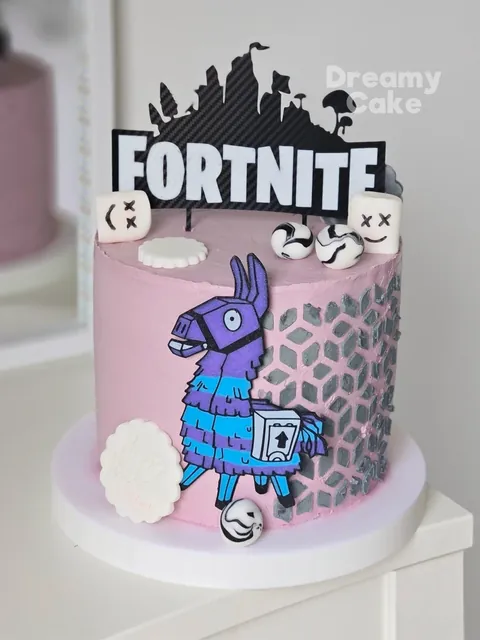 Fortnite themed birthday cake with llama design and black topper