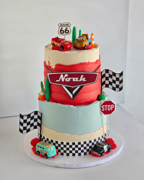 Two-tier racing car birthday cake with Route 66 details personalised for Noah