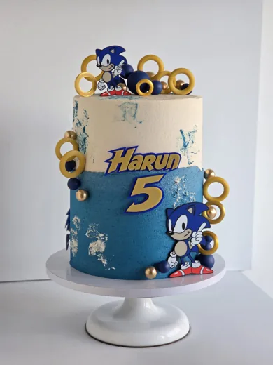 Blue and gold Sonic-themed birthday cake